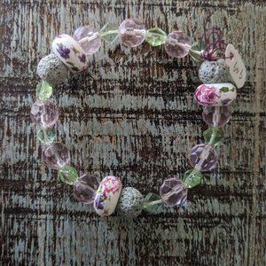 Lava Blooms: Handmade Floral Ceramic & Lava Stone Stretch Bracelet